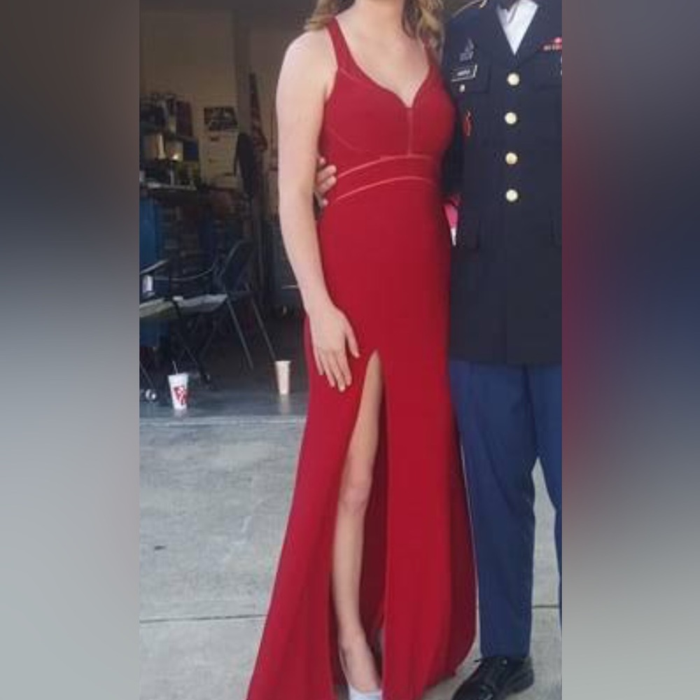 Red formal dress with slit and open back
